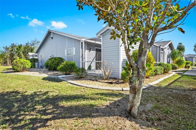 3300 Loveland Blvd Unit 3203, Punta Gorda, FL 33980 - view of front of property with a front yard