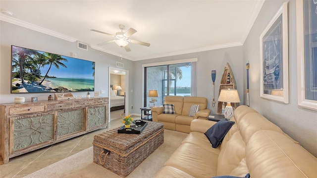 tiled living room with ornamental molding, a water view, and ceiling fan