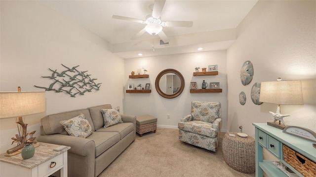 living room featuring ceiling fan and light colored carpet