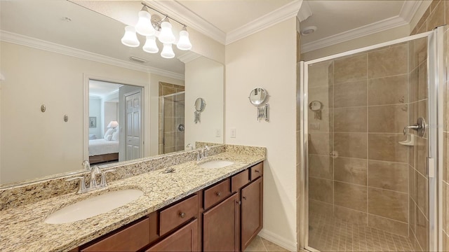 bathroom featuring vanity, an enclosed shower, and ornamental molding