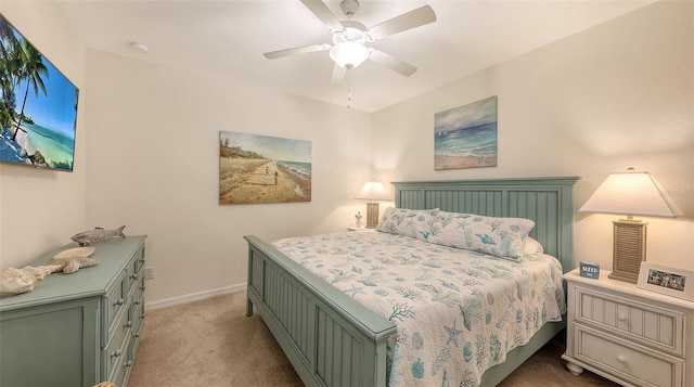 bedroom with light colored carpet and ceiling fan