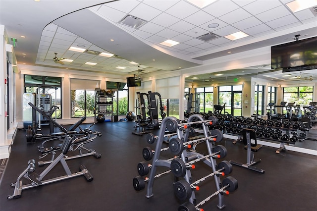 workout area with a paneled ceiling