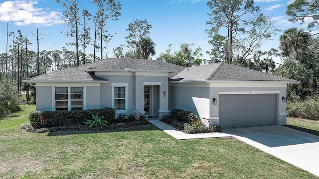 view of front of property with a garage and a front lawn