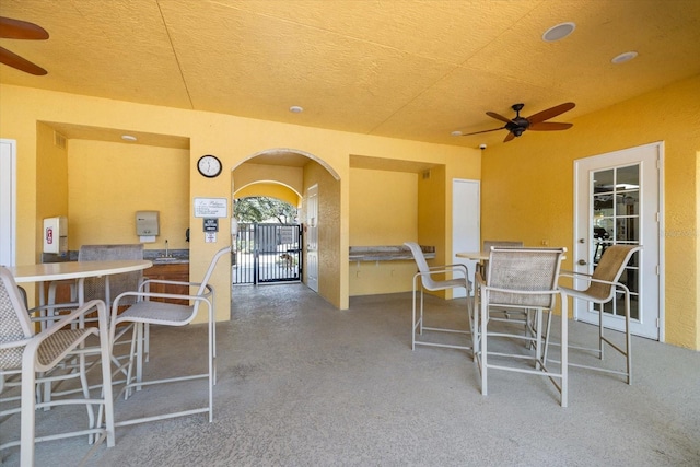 view of patio with ceiling fan