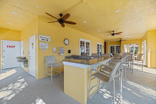 kitchen with a kitchen bar