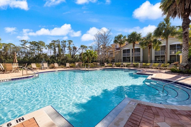 view of swimming pool featuring a patio