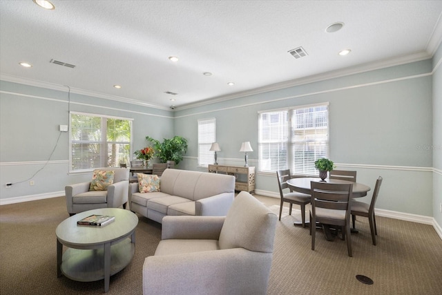 living room featuring crown molding and carpet floors