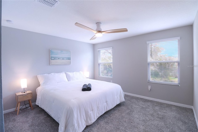 bedroom with ceiling fan and carpet flooring