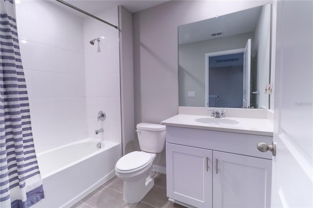 full bathroom featuring vanity, toilet, tile patterned flooring, and shower / bath combo