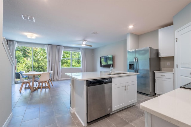 17136 Blowfish Dr, Nokomis, FL 34275 - kitchen with appliances with stainless steel finishes, light countertops, white cabinets, and recessed lighting