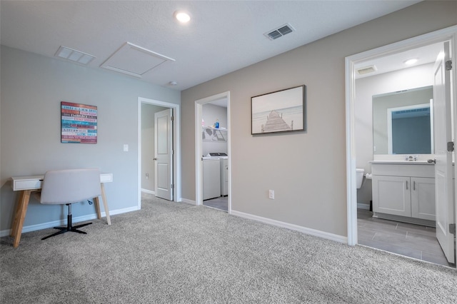 17136 Blowfish Dr, Nokomis, FL 34275 - bedroom with separate washer and dryer, light carpet, connected bathroom, a spacious closet, and attic access
