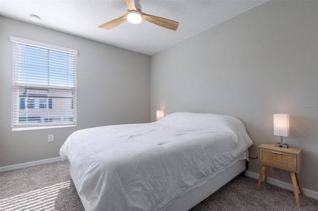 17136 Blowfish Dr, Nokomis, FL 34275 - carpeted bedroom with baseboards and ceiling fan