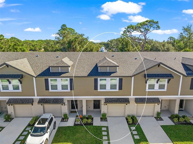 17136 Blowfish Dr, Nokomis, FL 34275 - multi unit property with an attached garage, driveway, roof with shingles, and a front yard