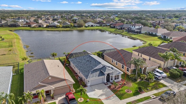 bird's eye view with a water view