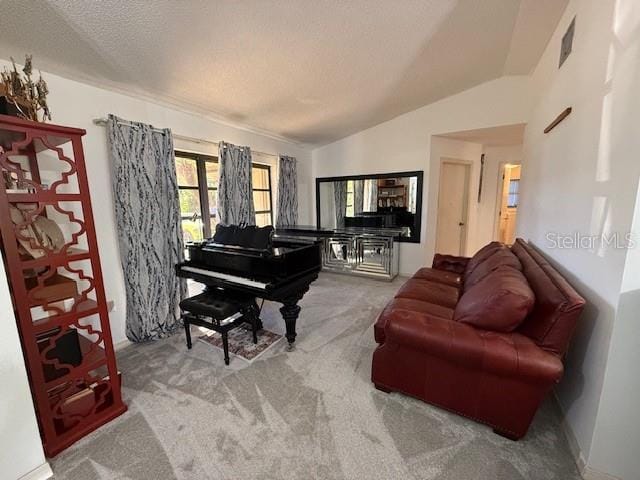 carpeted living area with lofted ceiling, visible vents, and a textured ceiling