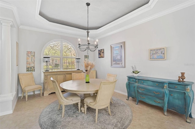 dining room with an inviting chandelier, light tile patterned flooring, a raised ceiling, and decorative columns