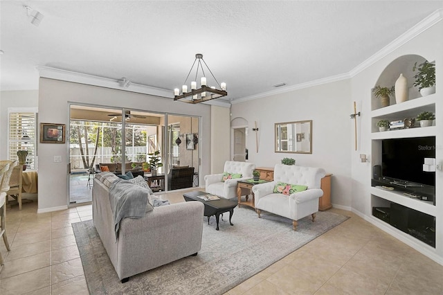 living room featuring a notable chandelier, ornamental molding, light tile patterned floors, and built in features