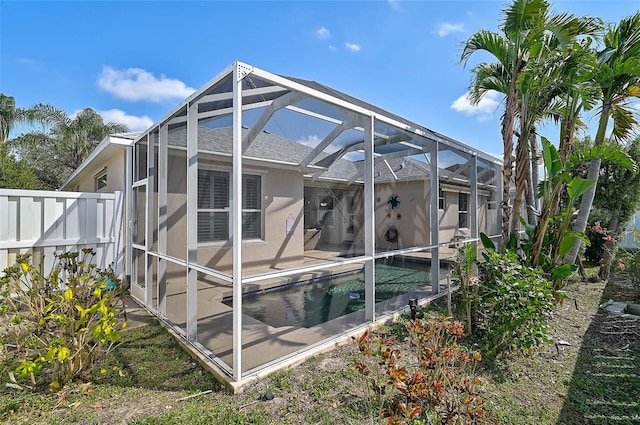 view of home's exterior featuring a lanai