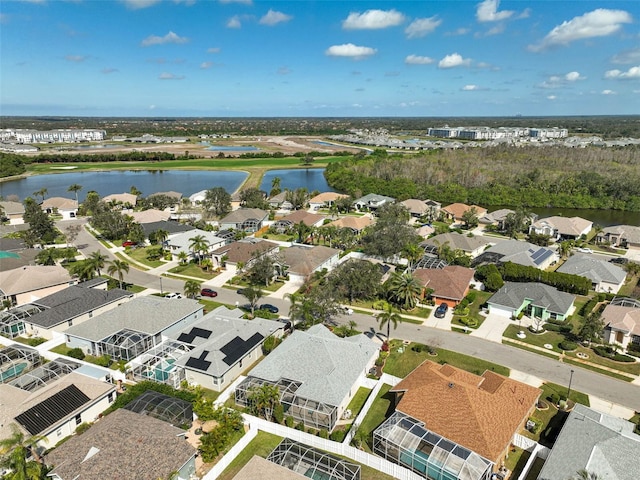 drone / aerial view with a water view