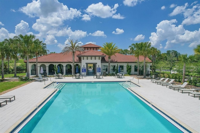 pool featuring a patio area