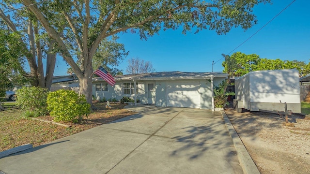 single story home with a garage