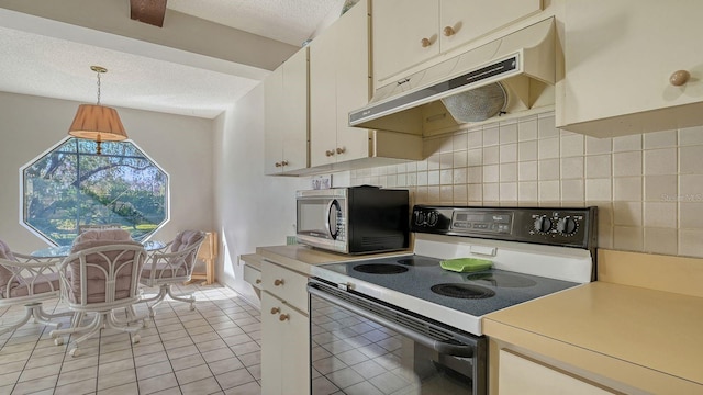 kitchen featuring decorative backsplash, a textured ceiling, hanging light fixtures, and range with electric stovetop