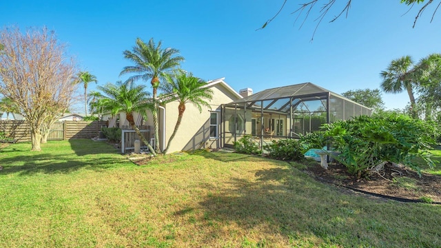 view of yard featuring a lanai