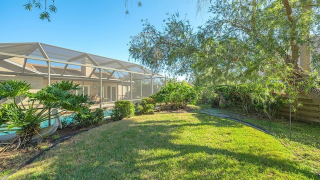 view of yard featuring a lanai