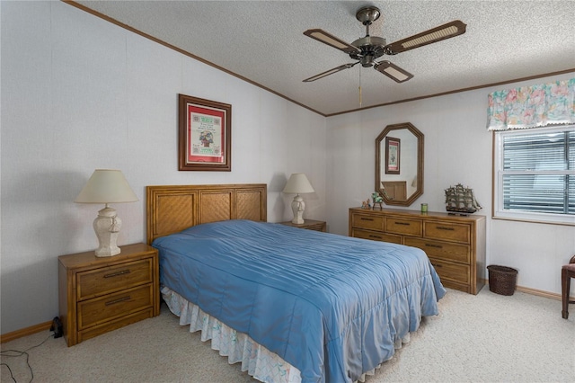 carpeted bedroom with lofted ceiling, ceiling fan, ornamental molding, and a textured ceiling