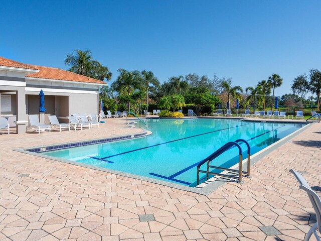 community pool featuring a patio