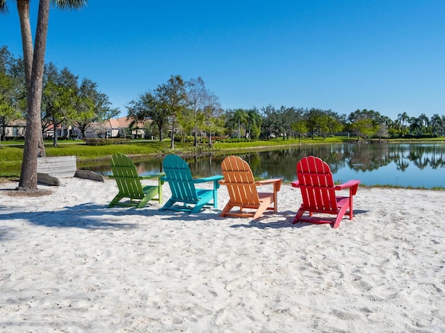 surrounding community featuring a water view