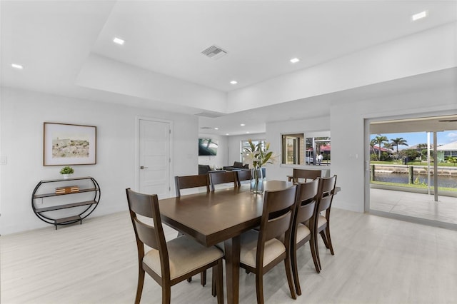 dining area with light wood-type flooring