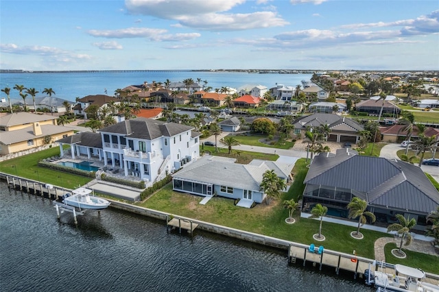 aerial view featuring a water view