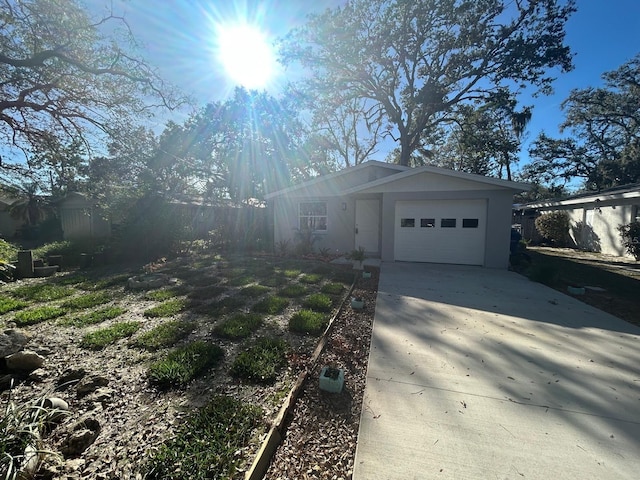 single story home with a garage