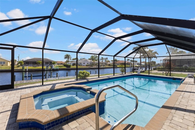 view of pool featuring an in ground hot tub, a water view, a patio, and a lanai