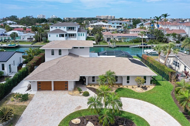 aerial view featuring a water view and a residential view