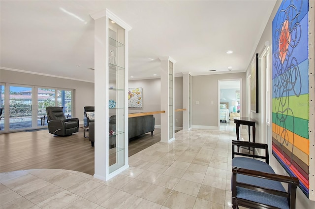 interior space with recessed lighting, crown molding, baseboards, and light tile patterned floors