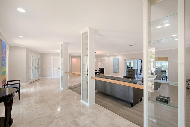 kitchen featuring ornamental molding, french doors, recessed lighting, and baseboards