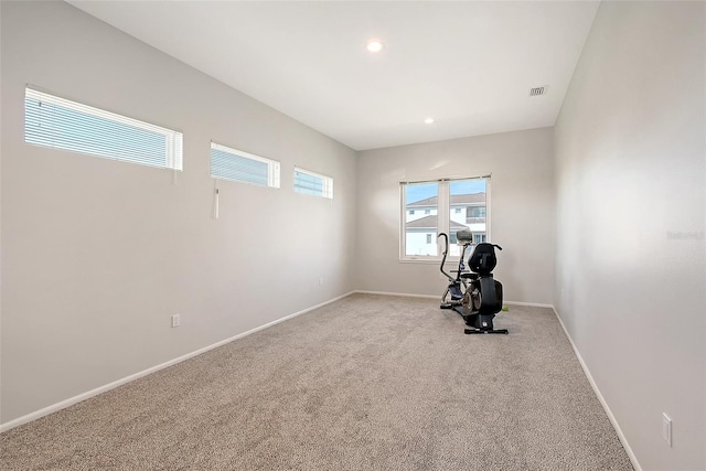 workout room with light carpet, recessed lighting, visible vents, and baseboards