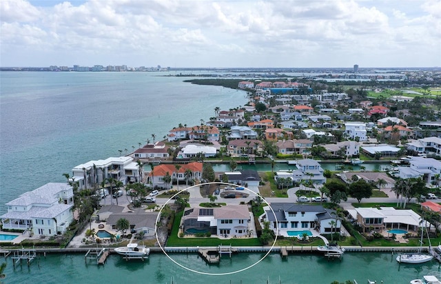 aerial view featuring a residential view and a water view