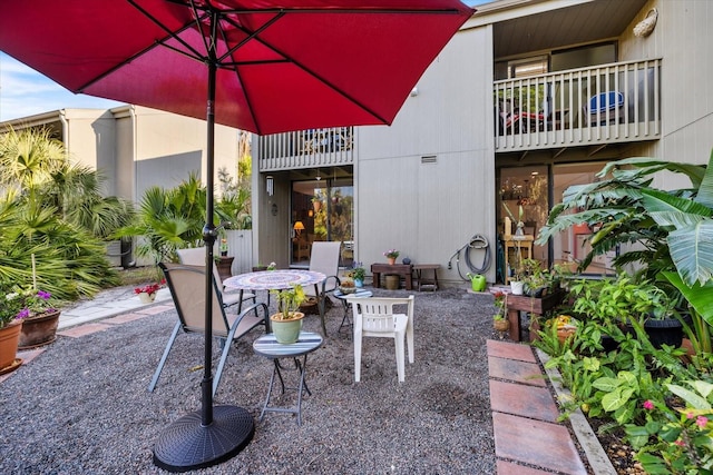 view of patio / terrace with a balcony