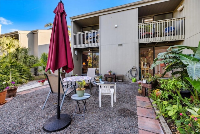 view of patio with a balcony