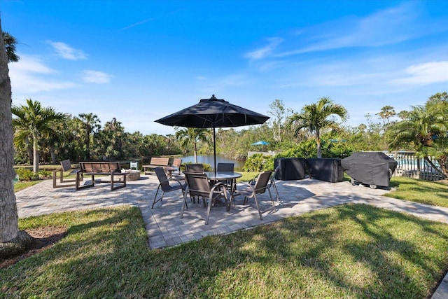 view of patio featuring a grill