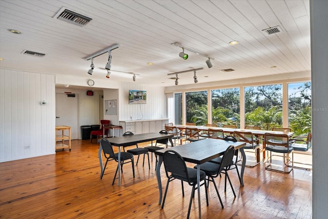 dining area featuring wood-type flooring