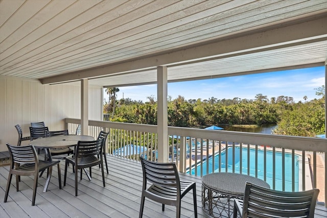 wooden deck featuring a water view