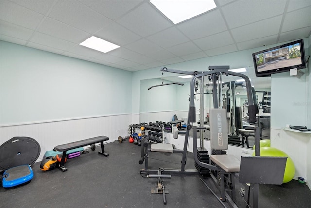 gym with a drop ceiling