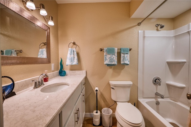 full bathroom featuring vanity, shower / washtub combination, and toilet