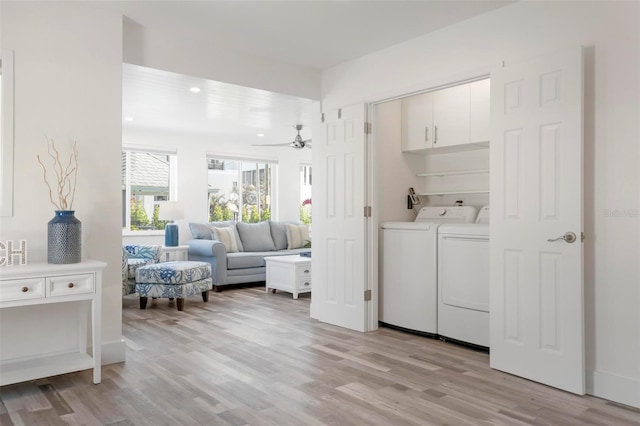 clothes washing area featuring recessed lighting, light wood-style floors, separate washer and dryer, ceiling fan, and laundry area