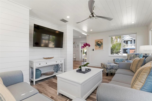 living room with visible vents, ceiling fan, recessed lighting, wooden ceiling, and wood finished floors