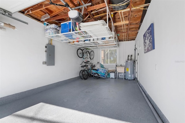 garage featuring water heater and electric panel